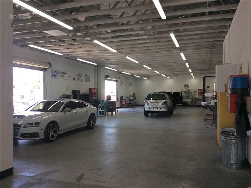 The real indoor repair bays at Ability Auto Body & Paint